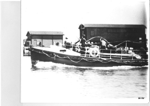 Photo of the Lifeboat QUEENSCLIFFE heading out & preparing to step the mast