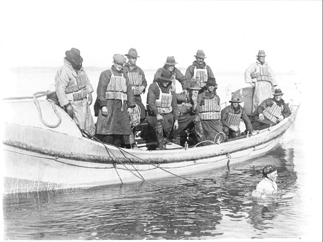 Black & white photo of "Breeches Buoy" practice from a lifeboat