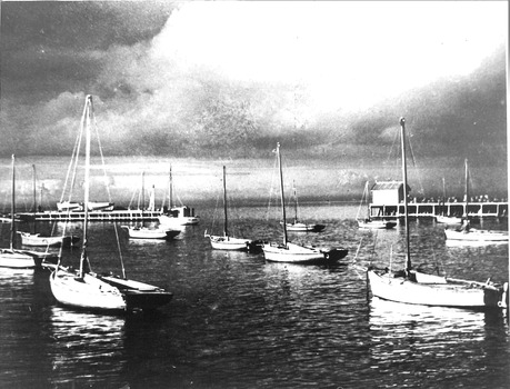 Moored boats under storm clouds at Queenscliffe
