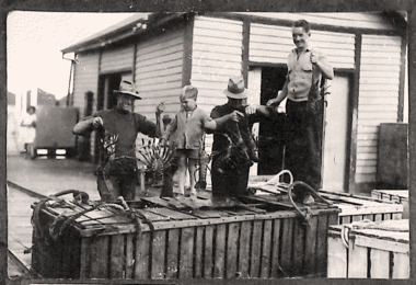 c1925 photo of Queenscliffe cray fishermen, their catch and boys