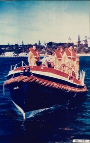 Colour photo of the Queenscliffe Lifeboat & crew under way off Queenscliffe.