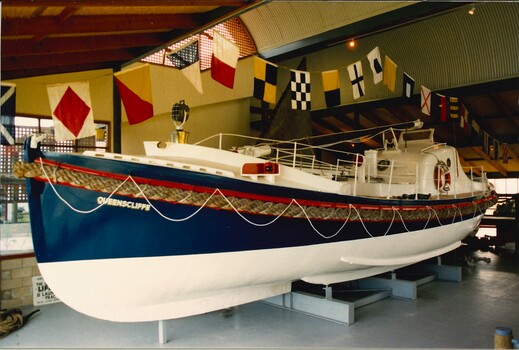 Recovered Queenscliffe lifeboat & signal flags inside new maritime centre at Queenscliffe 1987.