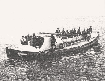 Lifeboat QUEENSCLIFFE at sea, mast down, b&w photo.