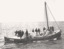 Lifeboat QUEENSCLIFFE at sea, mast up, b&w photo.