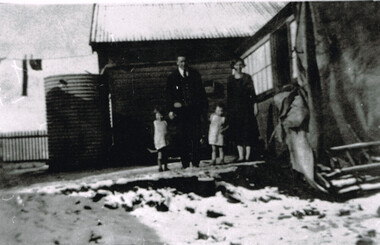 Photograph, Laurie McCabe, wife and children at their railway house, Beech Forest, Mid 1920s