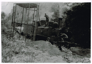 Photograph, Les Ogden, Locomotive 14A taking water at 10 mile tank, 1960-61