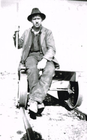 Photograph, Weeaproinah: Tom Woosnan on a trolley, c.1941, c.1941