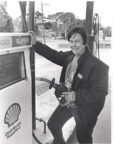 Photograph - PHOTOGRAPH. LADY AT PETROL PUMP