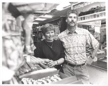 Photograph - PHOTOGRAPH. LADY AND MAN STANDING IN STORE, 10993