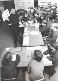 Photograph - PHOTOGRAPH. ALAN PRENTICE READS TO HIS 9 STUDENTS, 1993