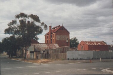 Photograph - EDITH LUNN COLLECTION: FREDERICK AND BASSEMIR'S OLD BAKERY, CORNER OF EDWARDS & WILLS STREETS, December 1986