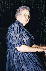 Photograph - PETER ELLIS COLLECTION: WOMAN PLAYING PIANO
