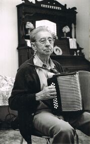 Photograph - PETER ELLIS COLLECTION: MAN PLAYING ACCORDION