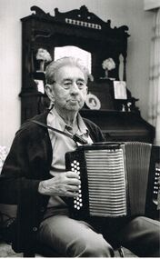 Photograph - PETER ELLIS COLLECTION: MAN PLAYING ACCORDION