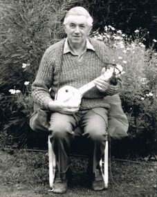 Photograph - PETER ELLIS COLLECTION: MAN PLAYING MANDOLIN