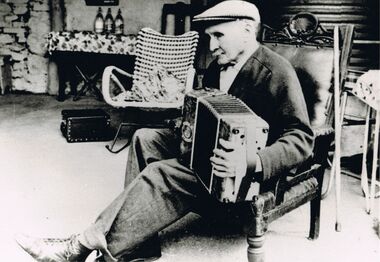 Photograph - PETER ELLIS COLLECTION: MAN PLAYING ACCORDION