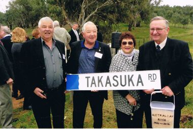 Photograph - PETER ELLIS COLLECTIONPEOPLE HOLDING TAKASUKA RD SIGN