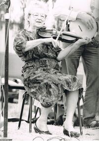 Photograph - PETER ELLIS COLLECTION: WOMAN PLAYING VIOLIN