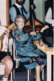 Photograph - PETER ELLIS COLLECTION: WOMAN PLAYING VIOLIN