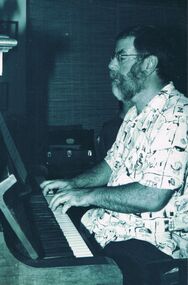Photograph - PETER ELLIS COLLECTION: MAN PLAYING PIANO