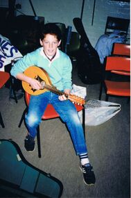 Photograph - PETER ELLIS COLLECTION: BOY PLAYING GUITAR