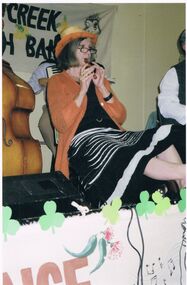 Photograph - PETER ELLIS COLLECTION: WOMAN PLAYING WOODEN PIPE WHISTLE
