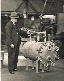 Photograph - BILL ASHMAN COLLECTION: MAN STANDING BESIDE SCALEBUOY