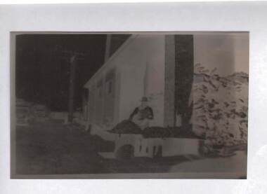 Negative - BILL ASHMAN COLLECTION: MAN BESIDE BUILDING