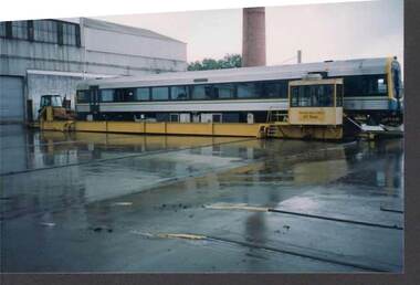 Photograph - RAILWAYS COLLECTION: TRAIN CARRIAGE AT A REPAIR SHOP