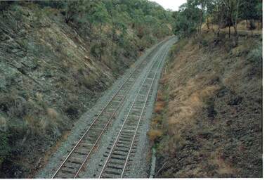 Photograph - RAILWAYS COLLECTION: DOUBLE RAIL TRACK RUNNING THROUGH A CUTTING