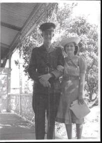Photograph - QC BINKS COLLECTION: MAN IN UNIFORM AND WOMAN HOLDING ONTO HIS ARM