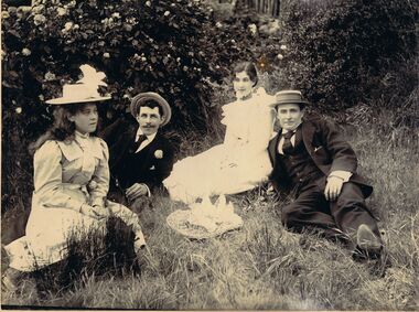 Photograph - GROUP OF PEOPLE IN GARDEN SETTING