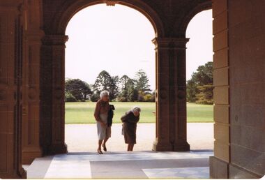 Photograph - COLOUR PHOTOGRAPH OF  BUILDINGS AND TWO LADIES