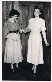 Photograph - BLACK AND WHITE PHOTOGRAPH  FEMALES IN FRONT OF WOOD PANELS
