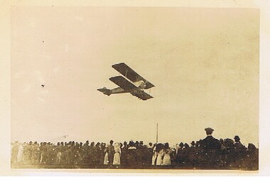 Postcard - BASIL WATSON COLLECTION:  BIPLANE FLYING OVER CROWD OF PEOPLE