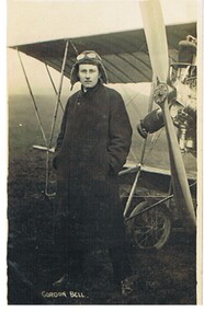 Postcard - BASIL WATSON COLLECTION: GORDON BELL IN FLYING OUTFIT, NEAR BIPLANE