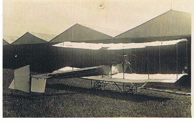 Postcard - BASIL WATSON COLLECTION: BIPLANE IN FRONT OF SHEDS