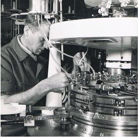 Photograph - HANRO COLLECTION: MAN OPERATING MACHINERY