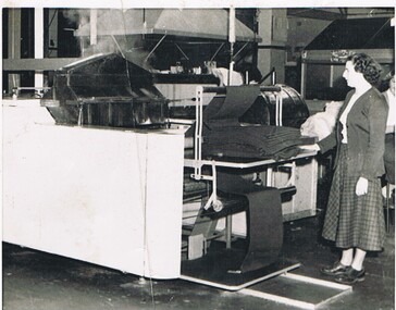 Photograph - HANRO COLLECTION: INTERIOR OF FACTORY, GARMENT PROCESSING MACHINE, ? 1950's