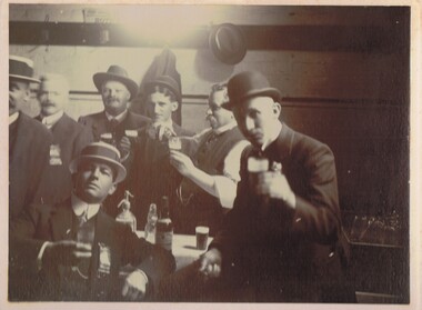 Photograph - GROUP OF MEN HAVING A DRINK
