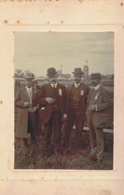 Photograph - FOUR MEN WITH MOUSTACHES, DRESSED IN SUITS