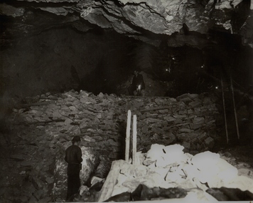 Photograph - UNDERGROUND MINE SHOWING FOUR WORKERS