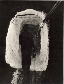 Photograph - MINER WALKING ALONG DRIVE AT CENTRAL DEBORAH GOLD MINE, 1951