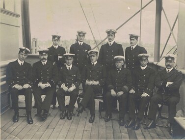 Photograph - NAVAL OFFICERS ON BRIDGE