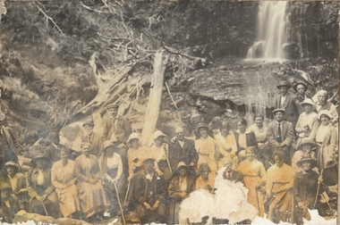 Photograph - GROUP PORTRAIT MALE AND FEMALES IN FRONT OF WATERFALL, approx. 1920's