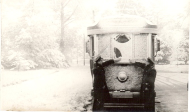 Photograph - BASIL MILLER COLLECTION: SNOW COVERED TRAM WITH TWO EMPLOYEES