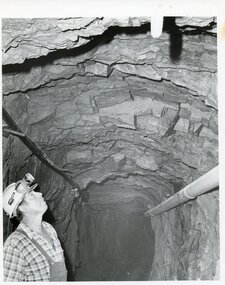 Photograph - AUSTIN COLLECTION: MINER CHECKING MINE ROOF