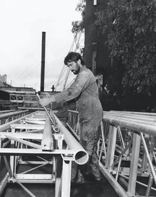Photograph - AUSTIN COLLECTION: MINER WORKING ON NEW LIFT