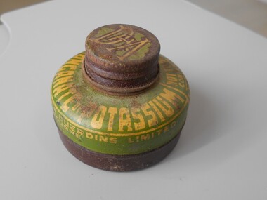 Container - PHARMACY COLLECTION: SMALL BOTTLE SHAPED TIN FOR PERMANGONATE OF POTTASIUM, 1940's