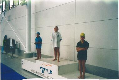 Photograph - VAL CAMPBELL COLLECTION: PHOTOGRAPH OF THREE YOUNG SWIMMERS INCLUDING OLIVIA ARANDT, 2004